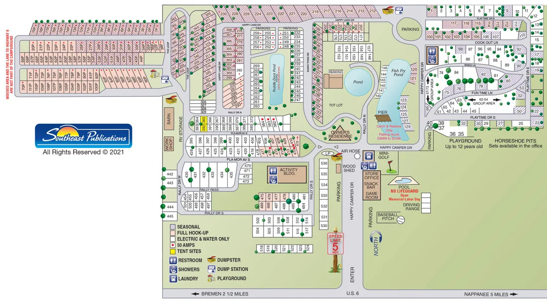 Pla-More RV Campground map showing numbered sites, the ponds, pool, store, Activity Building, playground, restrooms and dump stations. A full description is below.